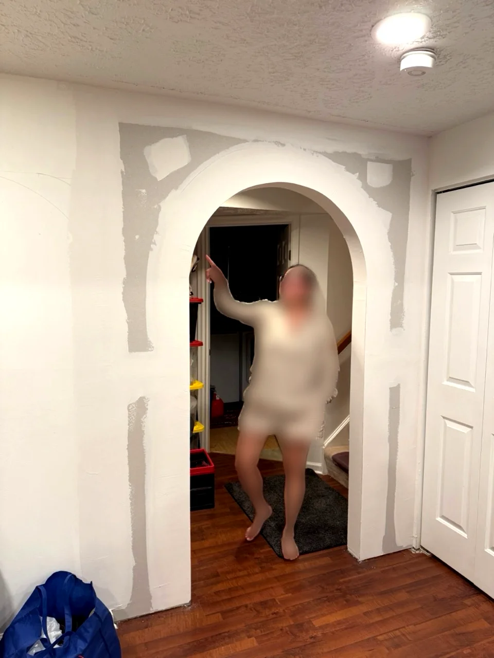 Taping and mudding an arched drywall opening